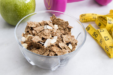 cereals, fruit and weights, concept of diet and living healthy
