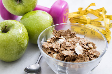 cereals, fruit and weights, concept of diet and living healthy