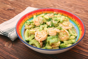 Avocado salad with shrimp and cucumber. Healthy lifestyle and eating concept.
