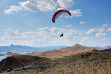 Flying over the hills/Paragliding over the coast of the Black sea, East Crimea. Villages near planerskoe, Koktebel
