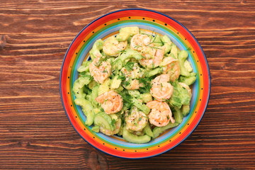 Avocado salad with shrimp and cucumber. Healthy lifestyle and eating concept.