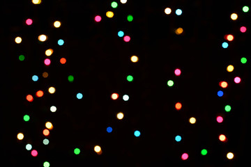 Fototapeta na wymiar Colorful defocused bokeh lights