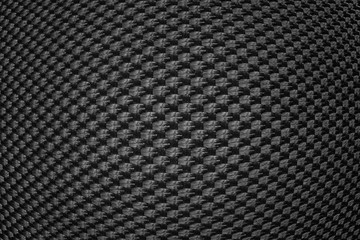Black convex texture of synthetic fiber.