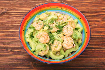 Avocado salad with shrimp and cucumber. Healthy lifestyle and eating concept.