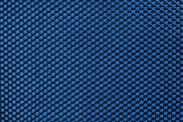 Blue symmetrical texture of synthetic fiber.