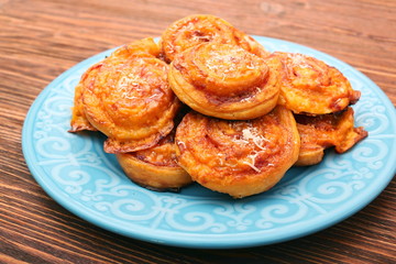 Puff pastry rolls with ham and cheese. Food for parties. Snack.