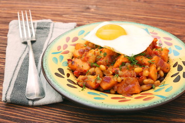 Sweet Potato Hash with Fresh Herbs, Peppers and Onions. Healthy eating concept. Nutritious breakfast.