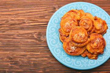 Puff pastry rolls with ham and cheese. Food for parties. Snack.