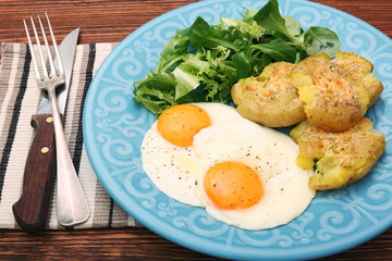 Crispy smashed potatoes breakfast. Healthy lifestyle concept.