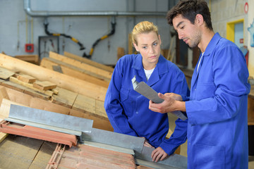 workers in carpentry workshop