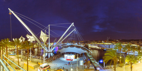 Panoramic elevator Bigo in the ancient port of Genoa on Mediterranean Sea, at night, Italy.