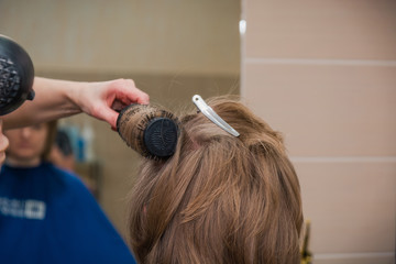 Naklejka premium Hairstyle in beauty salon