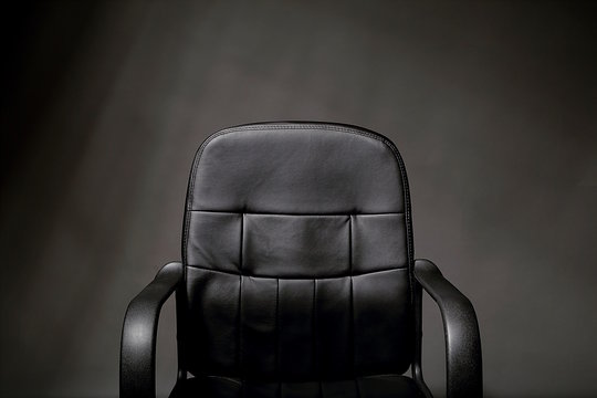 Empty Black Leather Office Chair