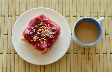 blueberry butter cake topping colorful candy and coffee