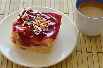blueberry butter cake topping colorful candy and coffee