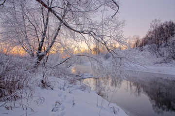 Naklejka na ściany i meble Winter sunrise on the river