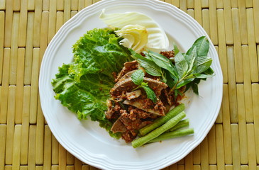 spicy minced pork and liver salad on plate