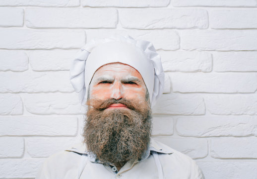 Man with flour on face