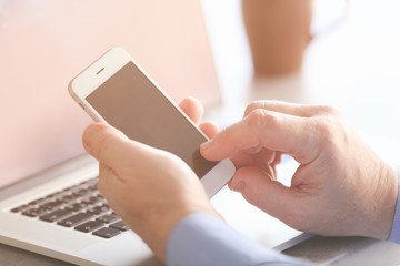 Senior man using smart phone