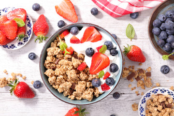 healthy breakfast with granola and berry fruit