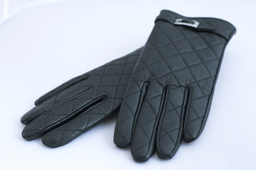 Black leather gloves