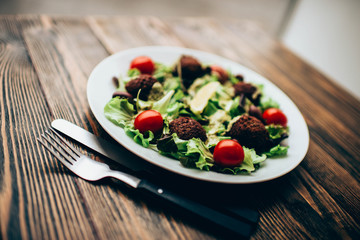 Salad with falafels