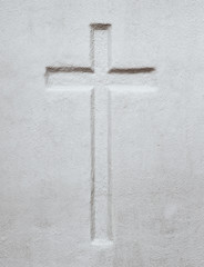 Christian cross sunken relief carving. 