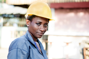 Portrait of a young worker in her workplace.