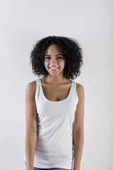 Attractive woman wearing white t-shirt, studio shot