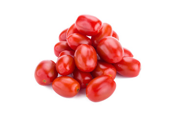 Ripe red tomatoes isolated on white background.