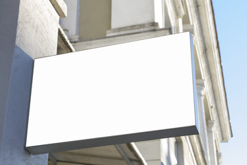 Signboard on the wall. Mock up