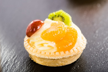 mini tart with pudding and fruit