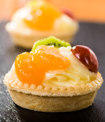 mini tart with pudding and fruit