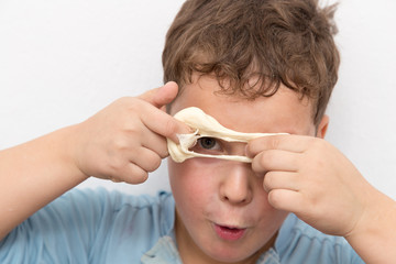 boy playing with dough