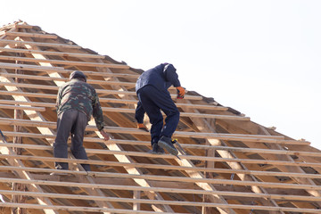workers working on the roof