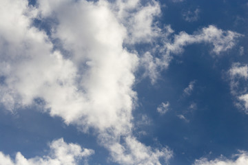 clouds in the blue sky as background