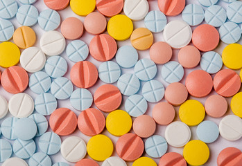 many pills white yellow blue red health