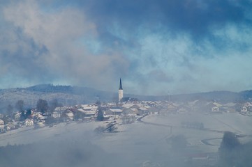 Winterlandschaft Dorf im Nebel 