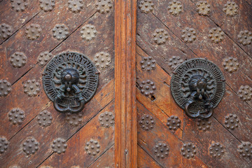Twin antique handles old style on wooden doors