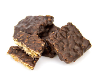 Chocolate candies isolated on white background .