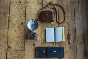 Vintage camera with bag and notepad