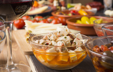 Spanish tapas starters on wooden table
