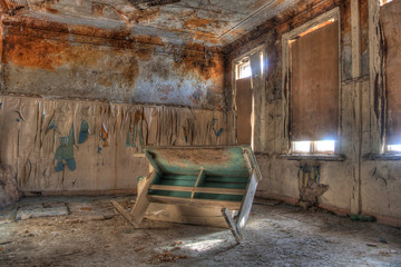 Fototapeta na wymiar Classroom in the abandoned and rotten rural school