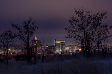 Unique skyline of Boise with winter foothills