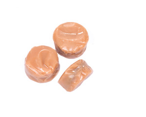 Milk toffee with chocolate cream isolated on white background