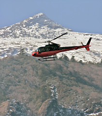 Obraz na płótnie Canvas The helicopter on the way from Namche Bazar to Lukla - Nepal Himalayas