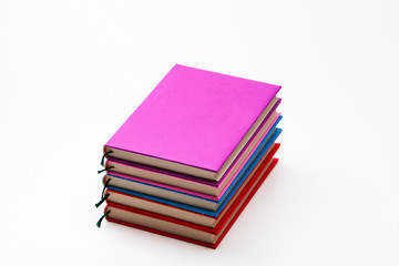 Stack of color books isolate on a white