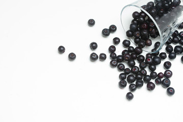 Iceberry and glass on a white