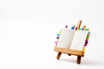 Note book on a reading desk isolate 