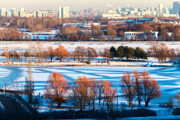 the city in the winter and in the snow
